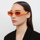 The Attico Berta Oval Sunglasses in Orange