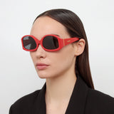 Colapso Special Sunglasses in Red by Jacquemus